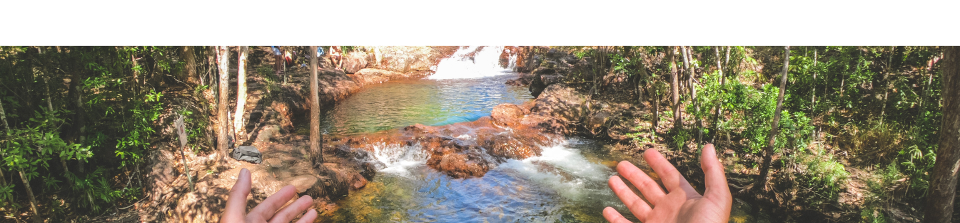 Buley rockhole in Lichfield National Park people swimming banner
